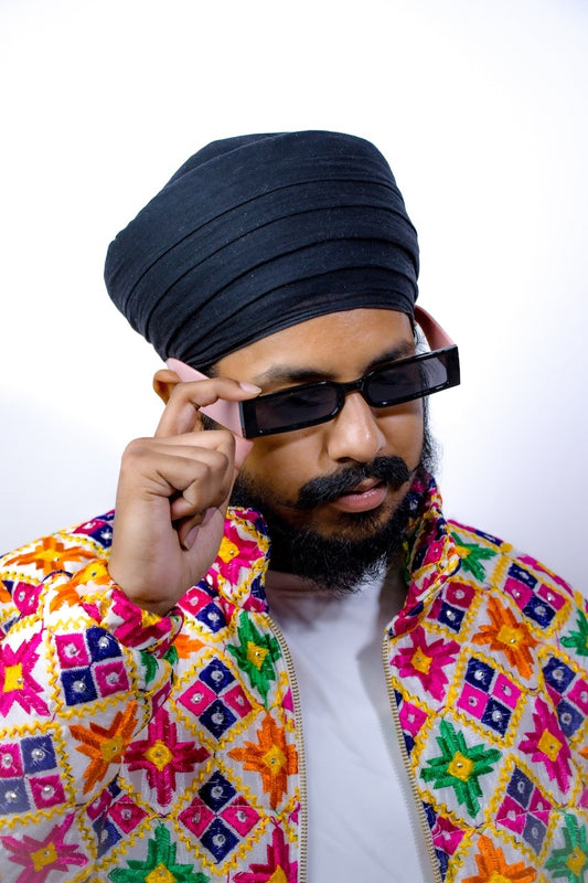 YOR Men’s White Phulkari Puffer Jacket with Phulkari embroidery