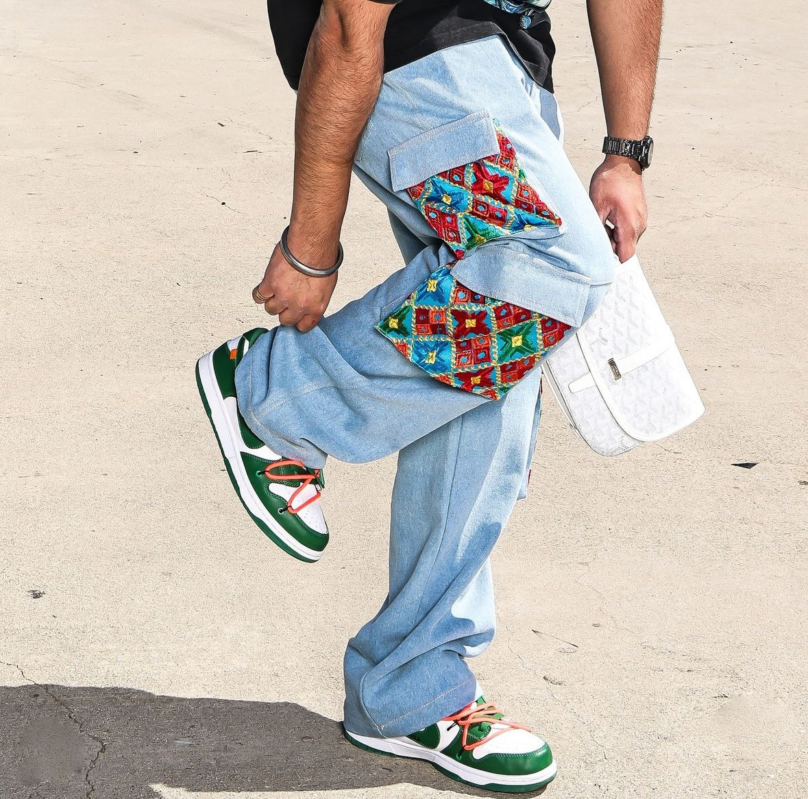 Close-up of YOR Phulkari denim cargo jeans showing Phulkari detailing on cargo pocket