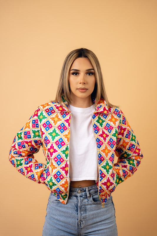 Woman wearing YOR Women’s White Phulkari Puffer Jacket with Phulkari embroidery